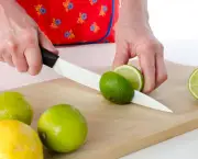 Woman cutting a lime in half